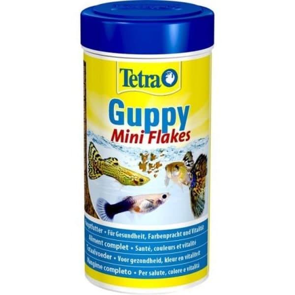 Tetra Guppy Foder - Næringsrige mini-flager for sundhed & farve. Køb nu på tildinfisk.dk. Hurtig levering!