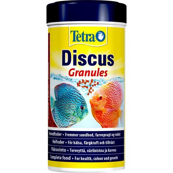 Billedet viser en beholder med Tetra Discus Granules fiskefoder, ideelt til farveforstærkning og vækst i akvariefisk.