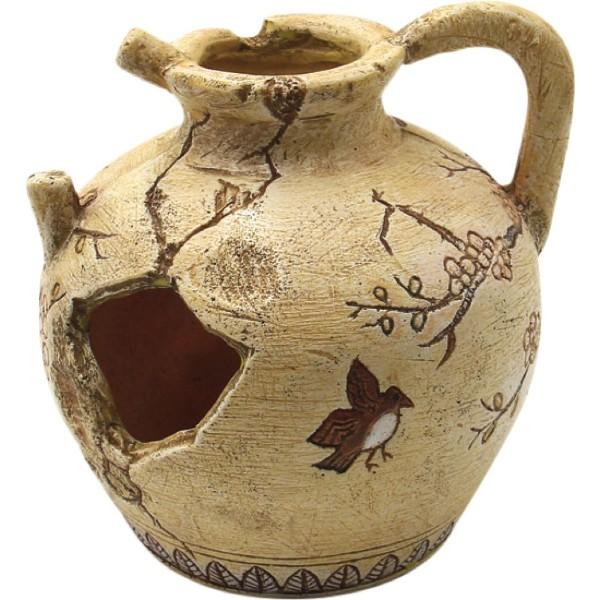 Dekorativ akvariehule formet som en fisk i terracotta stil med mønstre, ideel for fiskeophold og -leg.