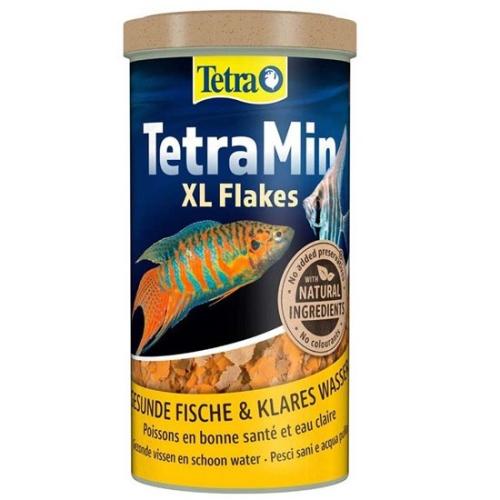 TetraMin XL Flakes fiskefoder til store tropiske fisk i en gul emballage, perfekt til akvariepleje, sundhed og farver.
